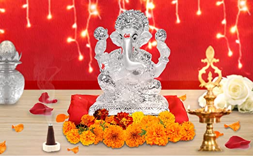 Diviniti 999 Silver Plated Sculpture of Lord Ganesha Figurine Religious Idol for Pooja, Gift  (7.4 CM X 5.3 CM X 10.5 CM)